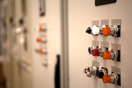 Close-up of knobs and levers of equipment