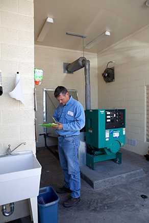FHSD employee checking levels of pump station