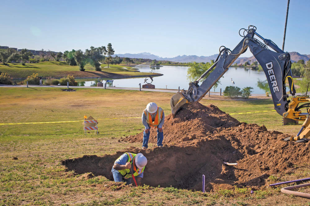 title="A Fountain Hills Sanitary District crew excavates a 16-inch effluent pipe in Fountain Park for  maintenance and repair.  (Photography by Mark Henle)